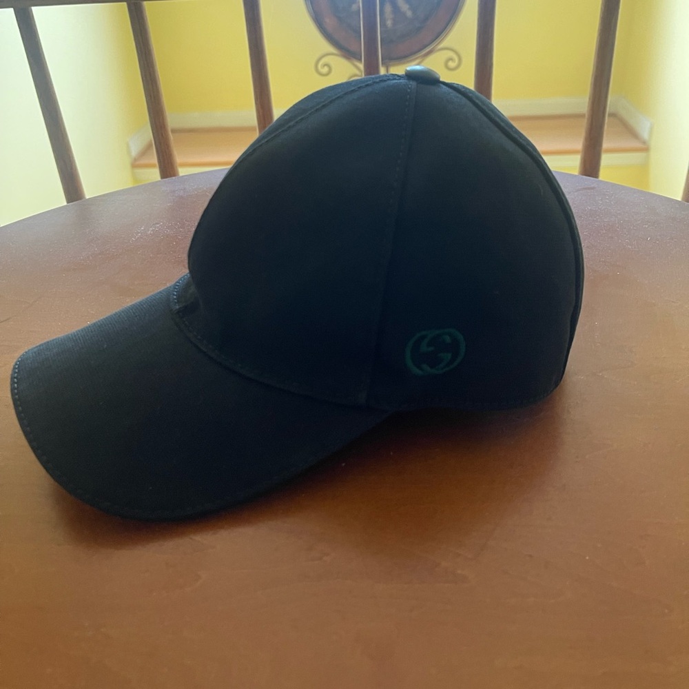 Gucci Black Hat with Green GG Logo on side and Sherry-line stripe on the back.